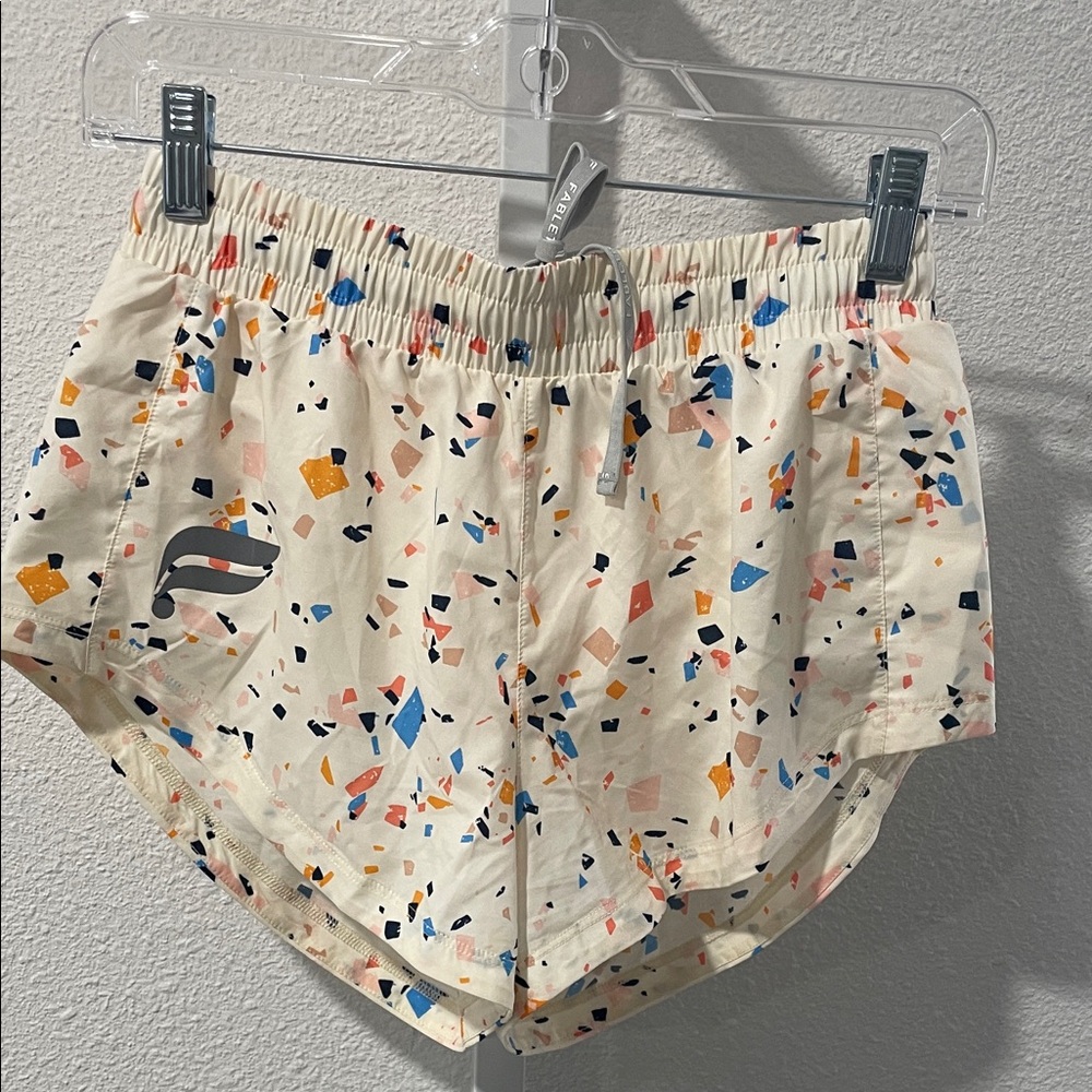 Fabletics Cream Speckle Athletic Shorts with Multicolor Print